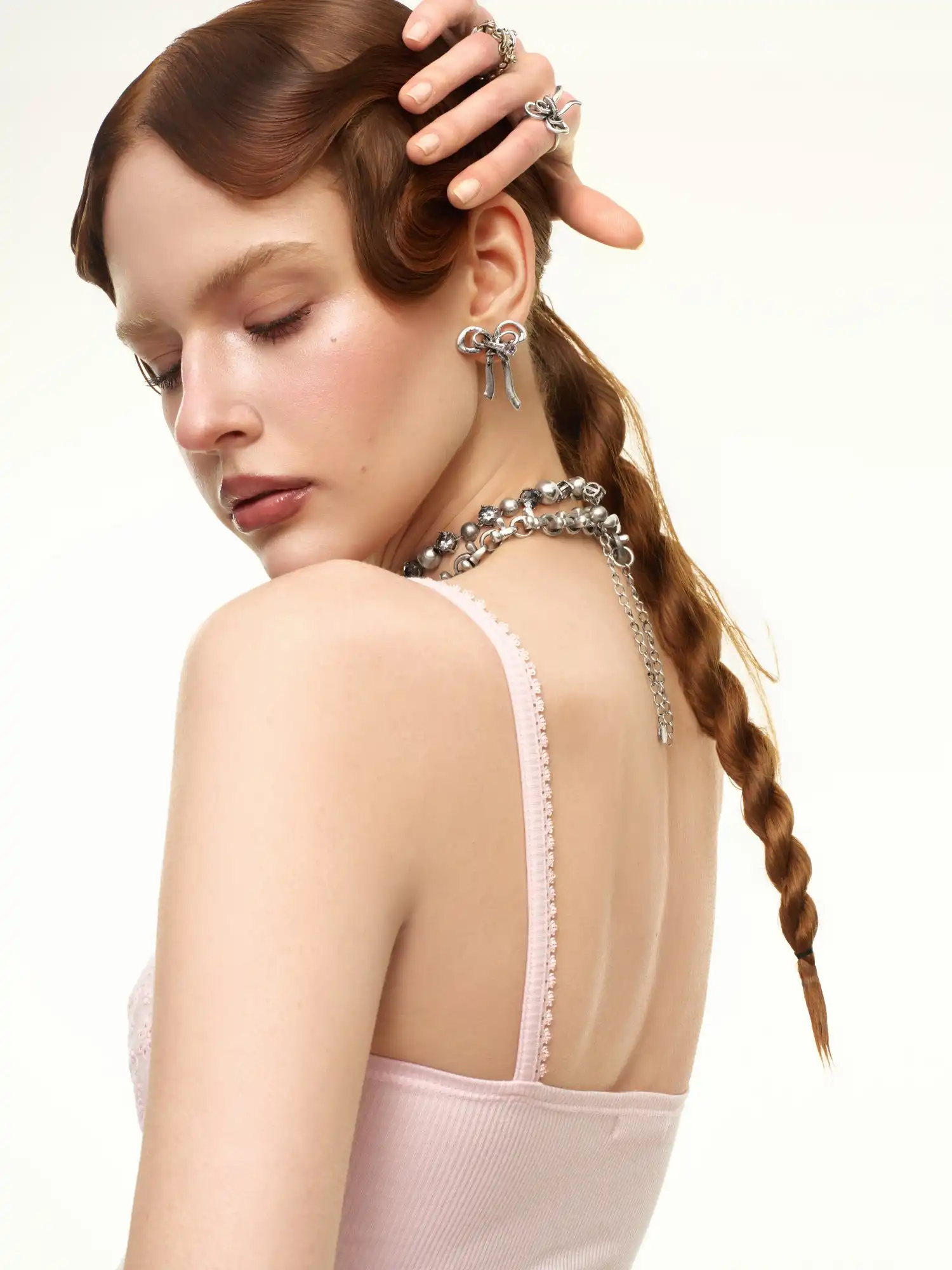 Antiqued Sculptural Bow Statement Earrings - Image 6
